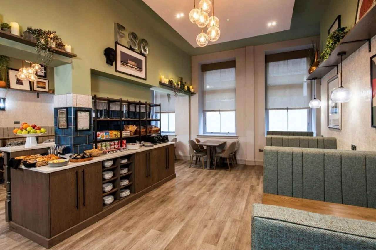a restaurant seating area at Fraser Suites Glasgow in Glasgow