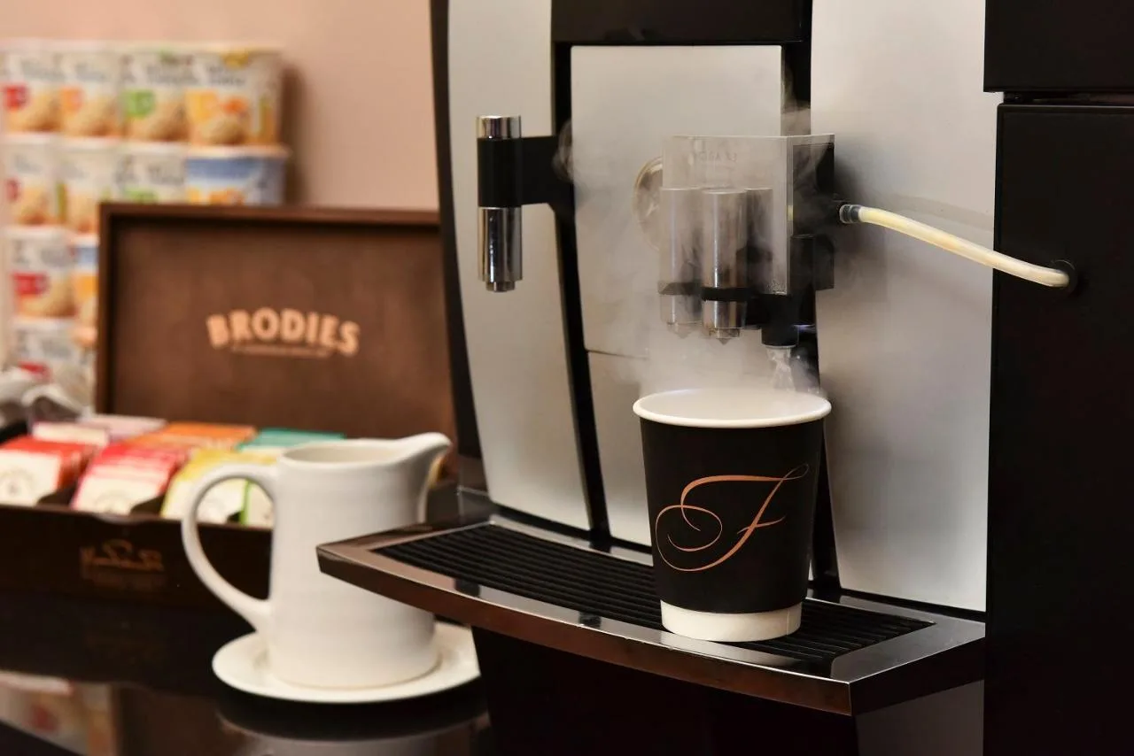 a coffee machine on a counter at Fraser Suites Glasgow in Glasgow